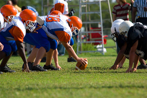 Addressing Spine Health in Contact Sports: Concussion Awareness and Neck Injury Prevention